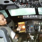 Mark R. in the UK takes his "There I Wuz!" Bible with him to his B-737 sim session!