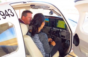 Eric and Bunny in Cochise College airplane cockpit